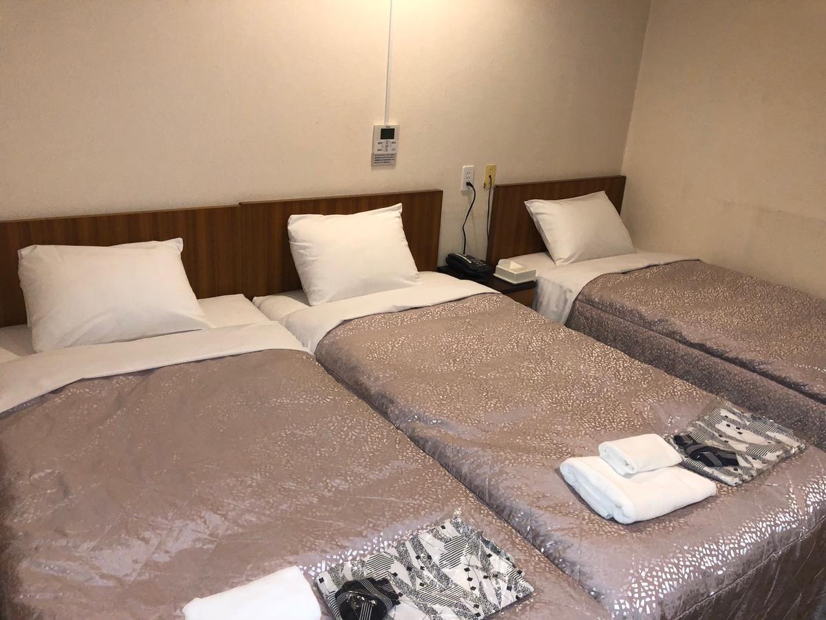 Business Hotel Kudo Nobeoka Buitenkant foto